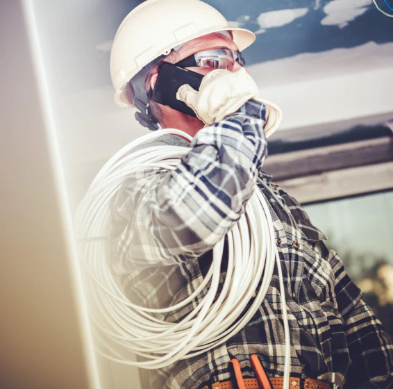 electrician talking to their client